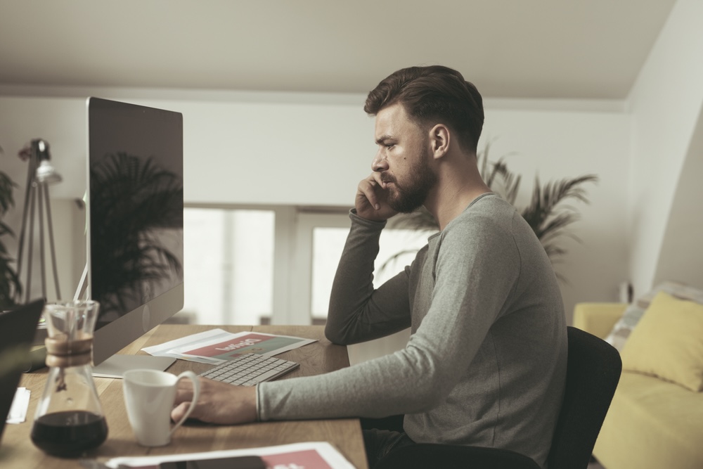 Man researching about addiction on the computer