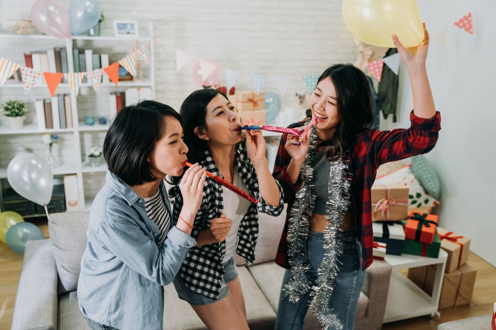 A group of sober women happily partying for the New Year's Eve