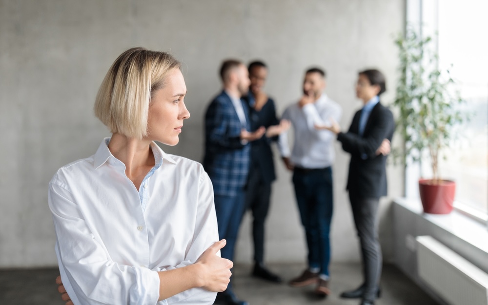 Woman worried about colleagues talking about her addiction and going to rehab