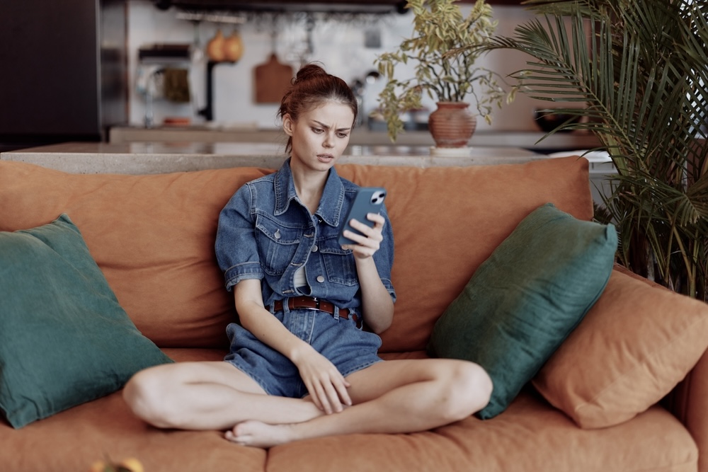 Woman using her phone too much excessive screen time